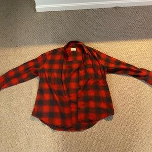 Large red and black plaid shirt.